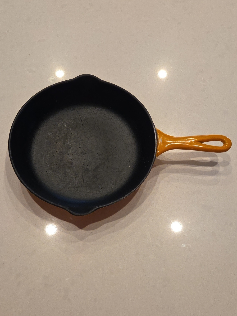 Le Creuset Cast Iron Skillet with Orange Handle